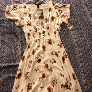 White floral dress. Never Worn.
